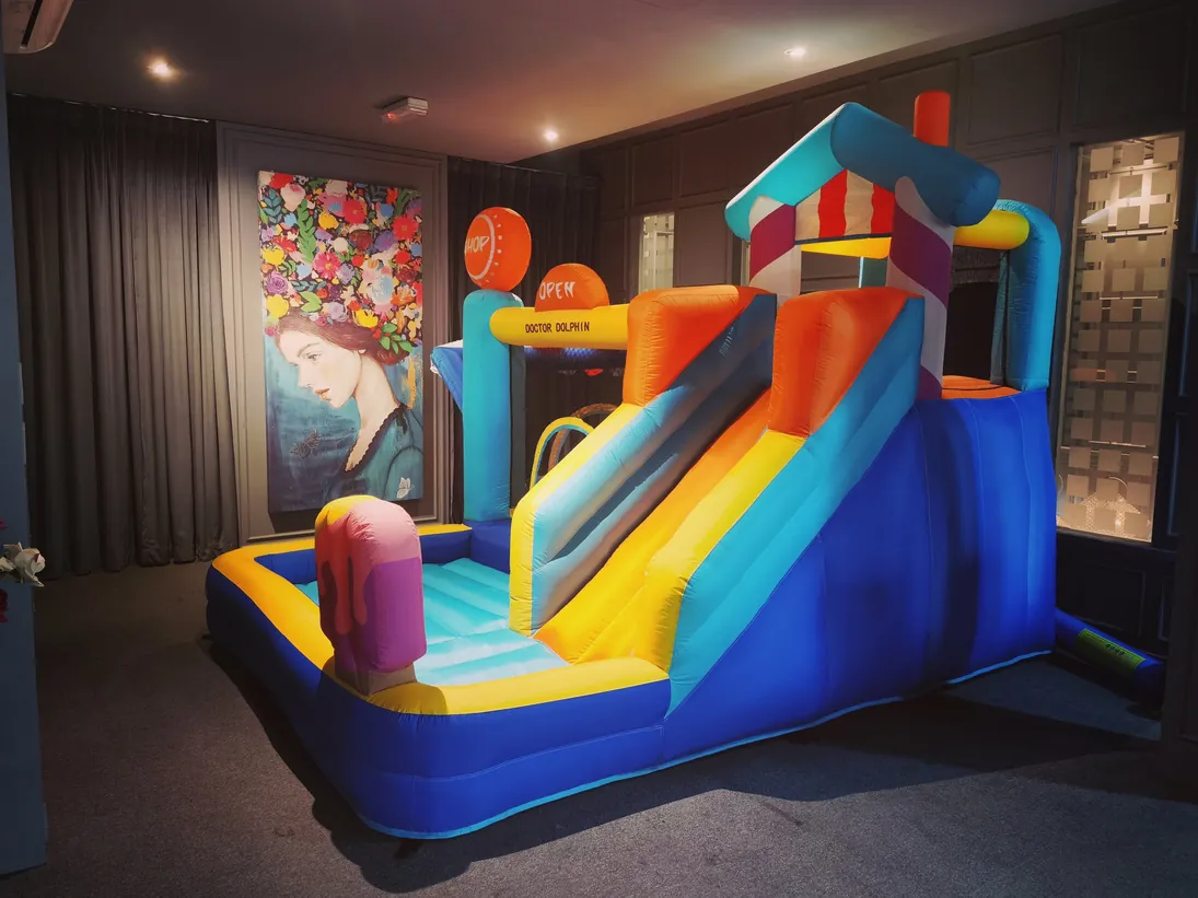 Blue and orange castle with a wide slide lane